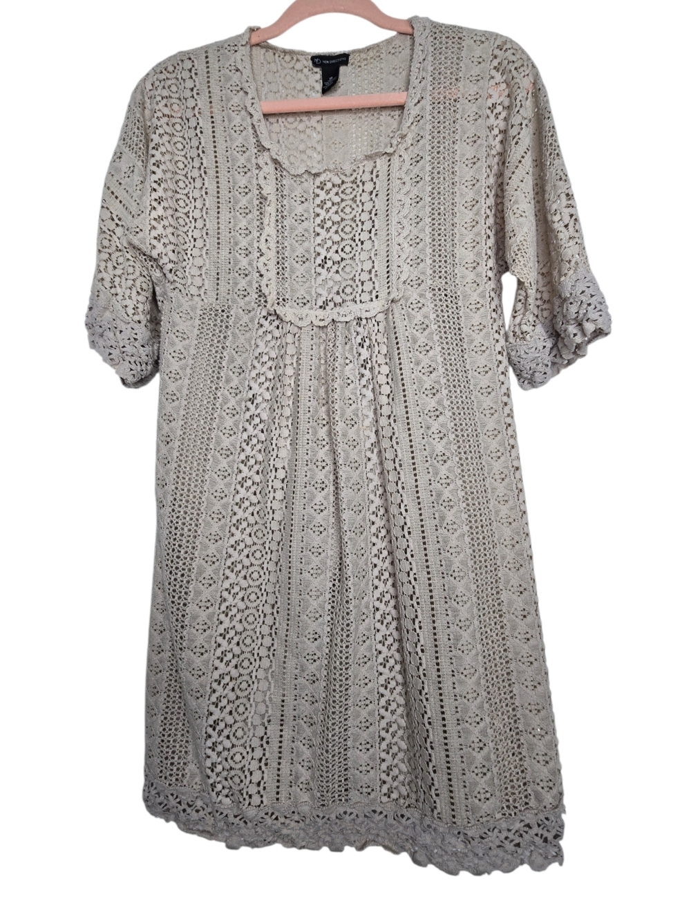New Directions A-line silhouette with a scoop neckline and 3/4 length sleeve